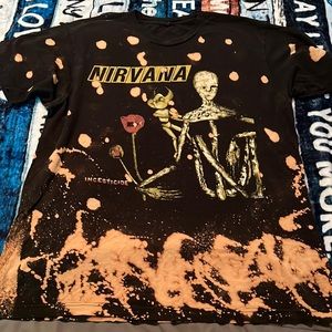 Vintage Nirvana tee shirt. Small normal wear holes on back side of left sleeve